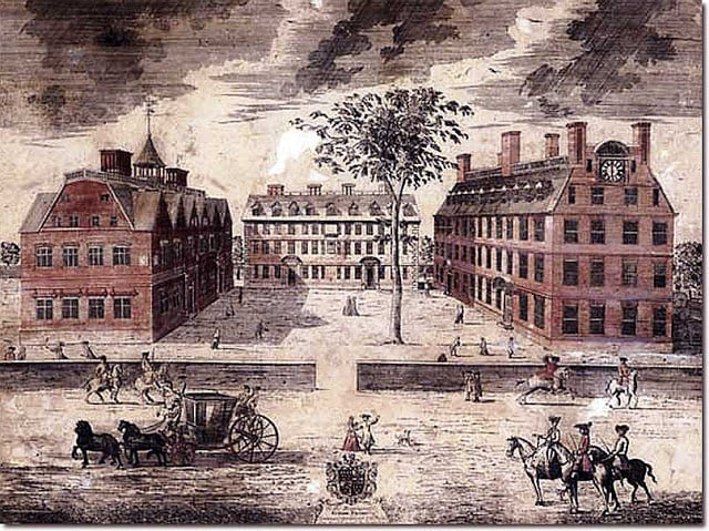 An old black-and-white image of Harvard College, America's first college, showing its early colonial architecture and surrounding grounds.