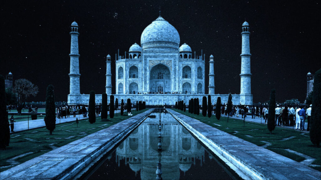 A serene, moonlit view of the Taj Mahal with its golden glow reflecting on the calm waters of the Yamuna River.